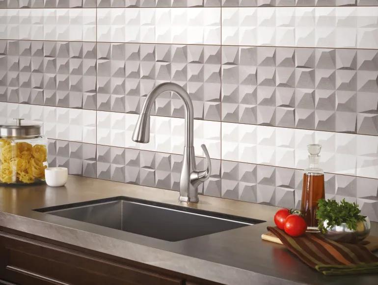 Luxurious small kitchen design using white & gyey tile with sink